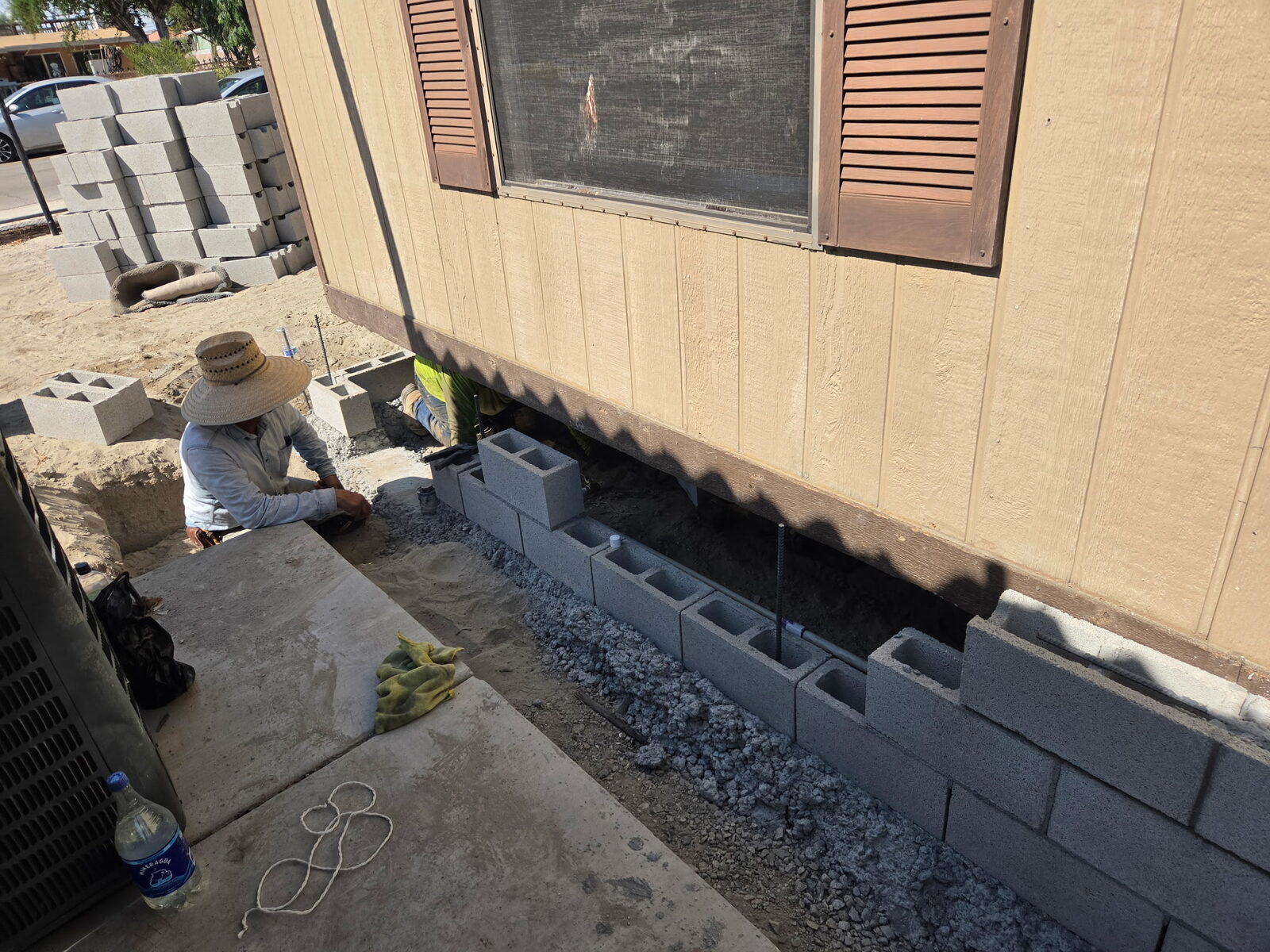 Completed grouted stem wall along the home's foundation